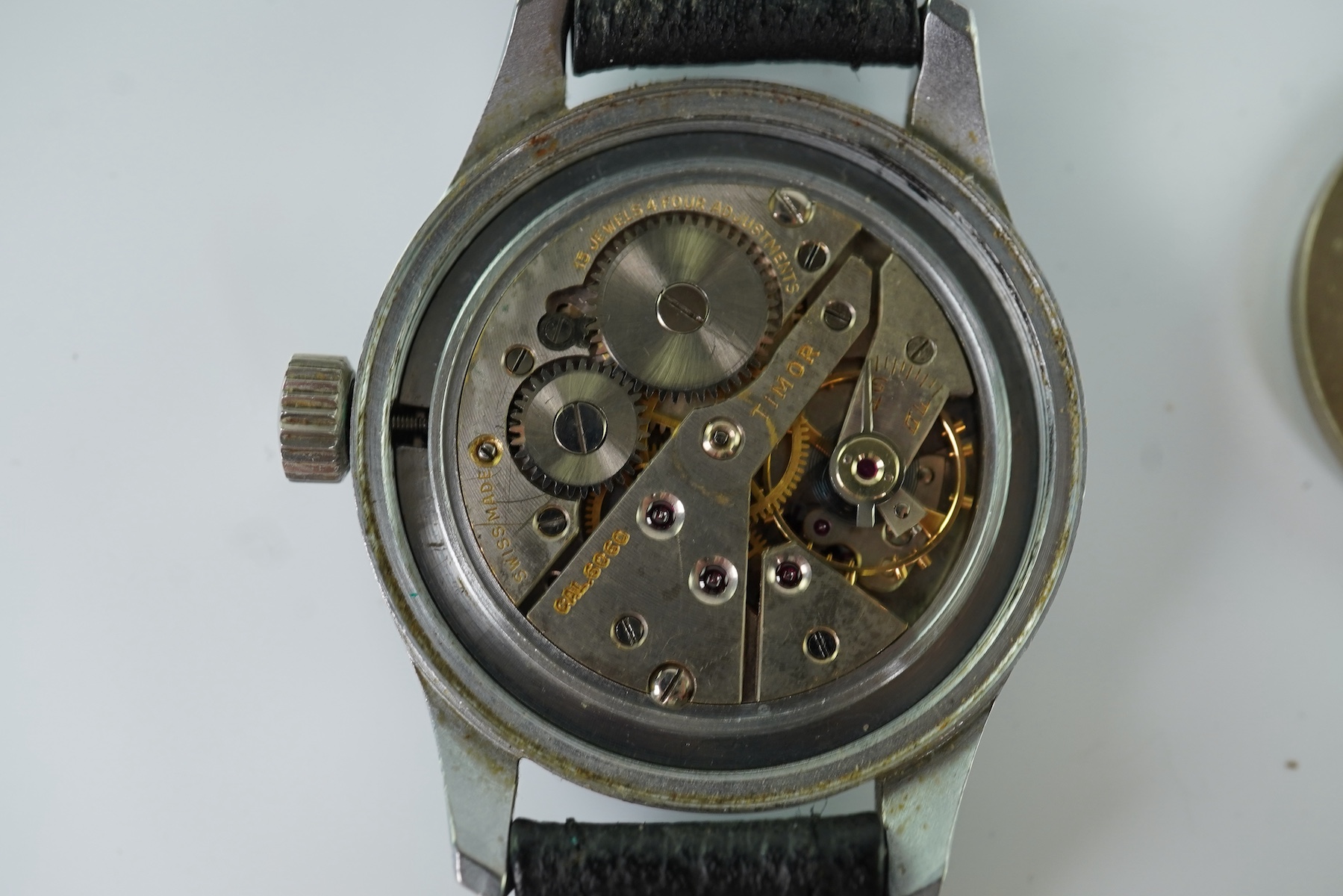 A gentleman's steel Timor WWW British Military 'Dirty Dozen' manual wind wrist watch, circa 1945